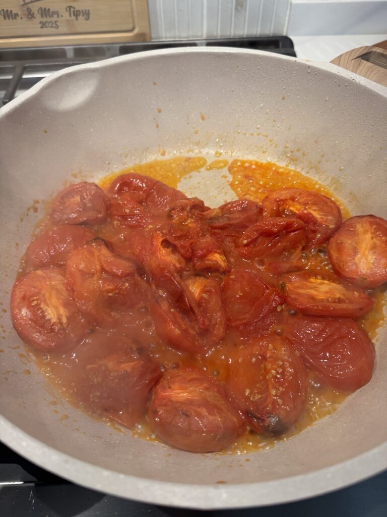 Tomatoes cooking in the pan