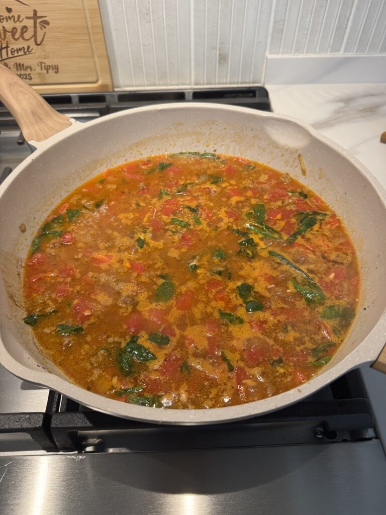 The tomato bouillon mixture cooking