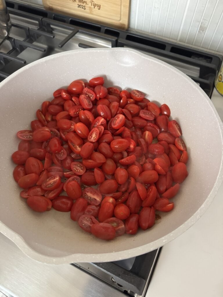 A bowl of sliced grape tomatoes
