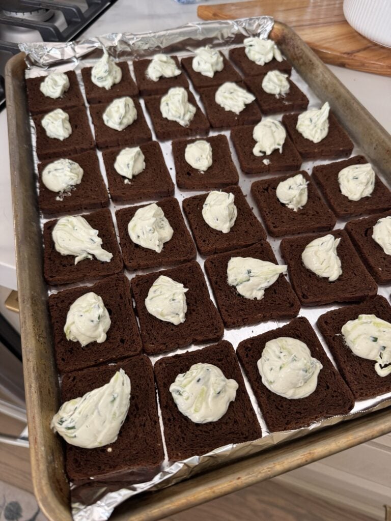Cream cheese that has been piped on to toasts
