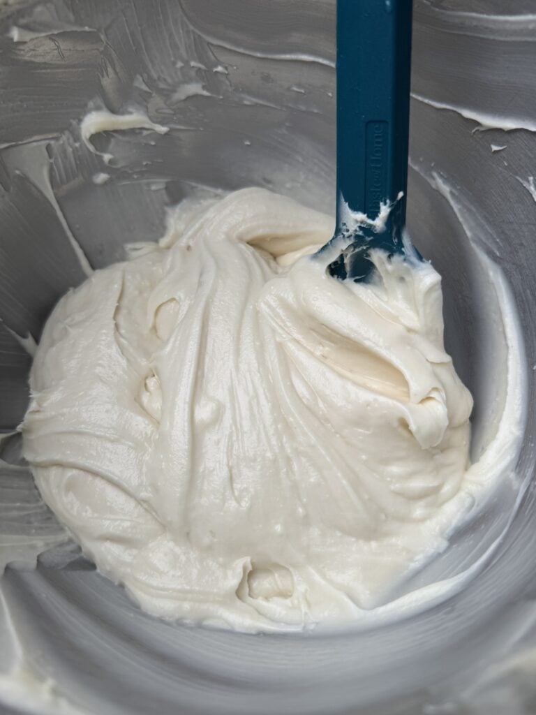 Icing in a metal bowl