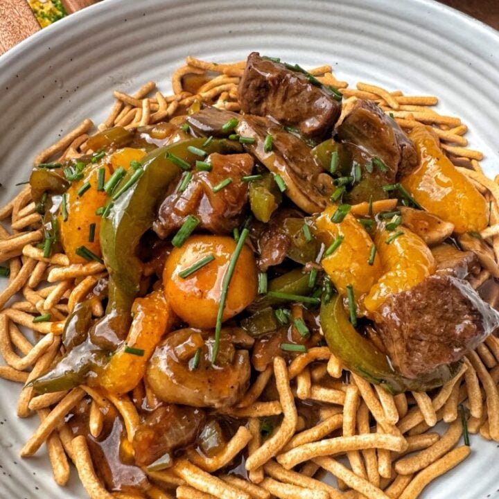Cantonese beef and veggies over crispy noodles