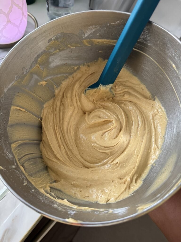 Cake batter in a metal bowl