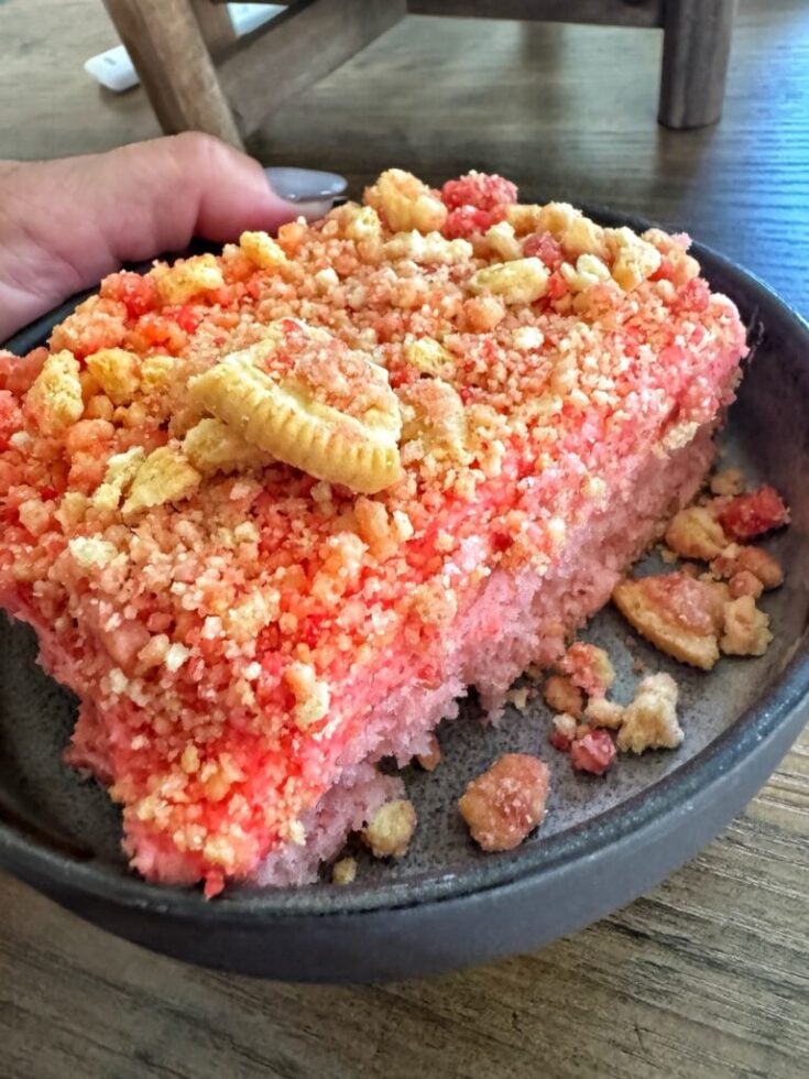 A piece of strawberry crunch cake