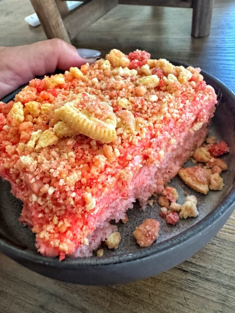 A piece of strawberry crunch cake