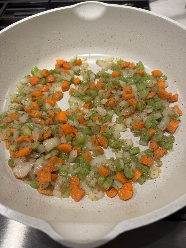 Carrots, celery, and onions in the pan