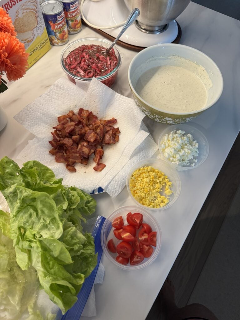 The components of the salad on the counter