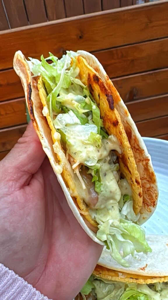 One of the finished tacos in hand