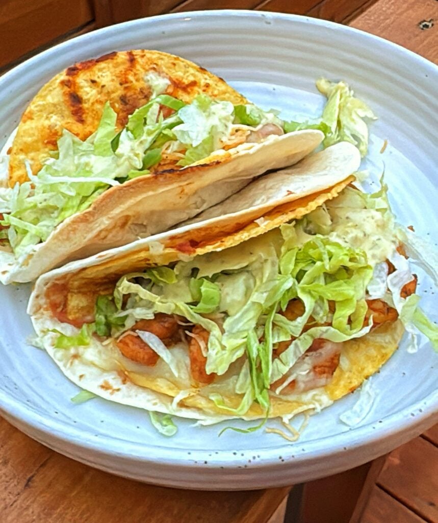 Double decker cheesy chicken tacos