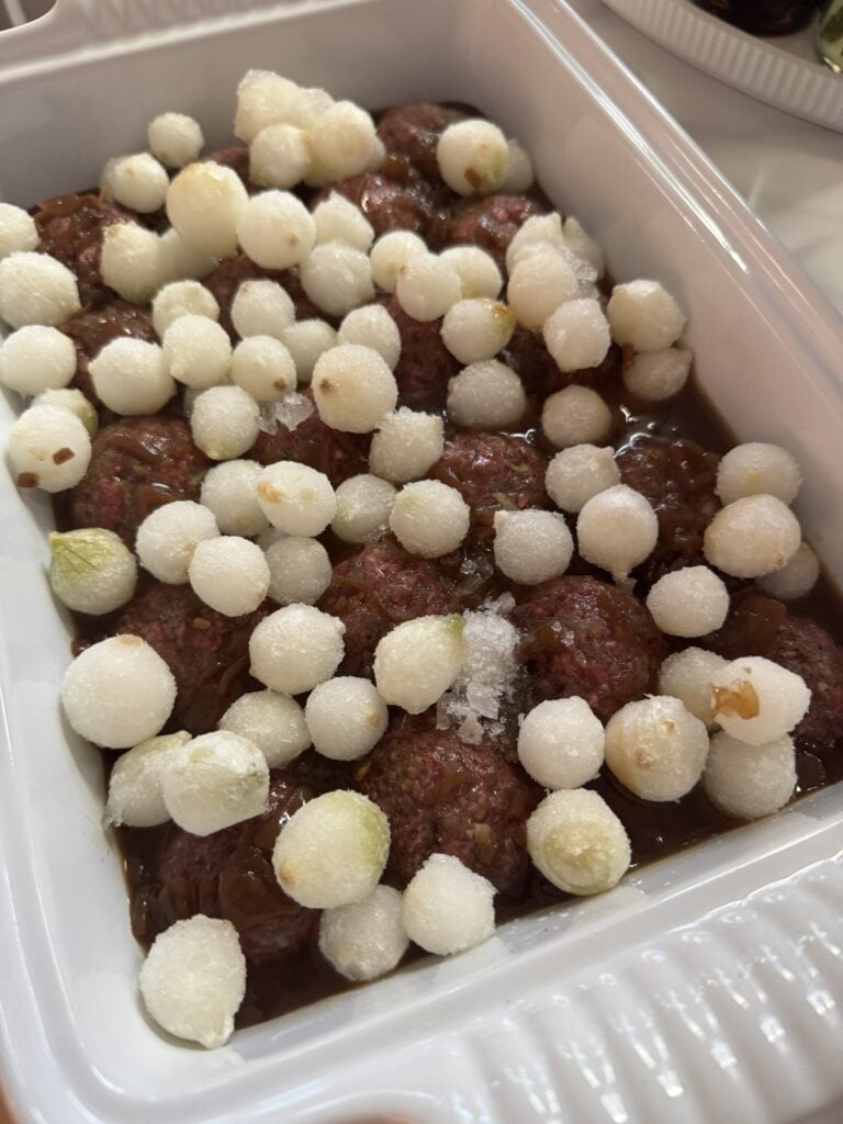 Pearled onions over meatballs