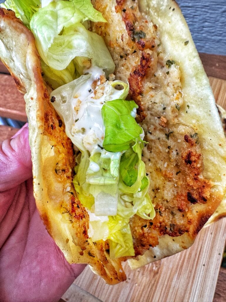 A close up of a finished taco