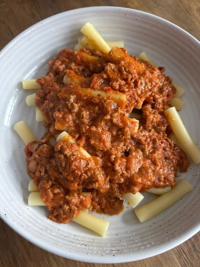 The finished sauce over ziti