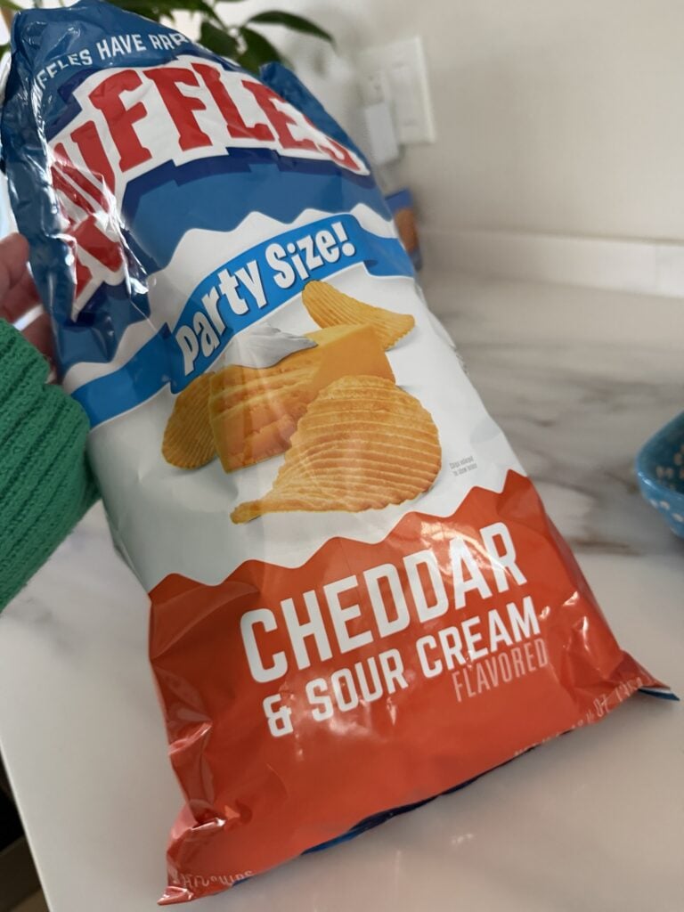 A bag of Cheddar and Sour Cream Ruffles chips