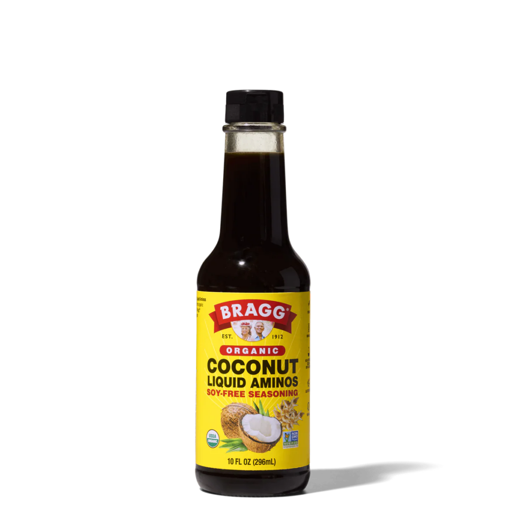 A bottle of Bragg coconut aminos