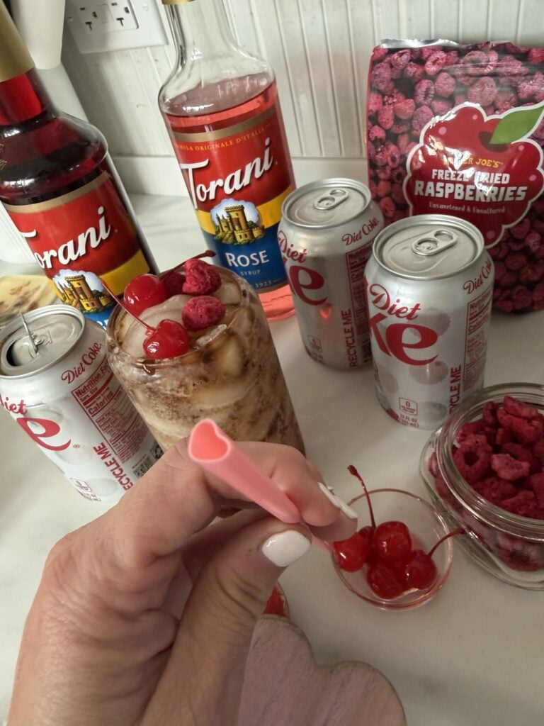 A pink, heart shaped straw