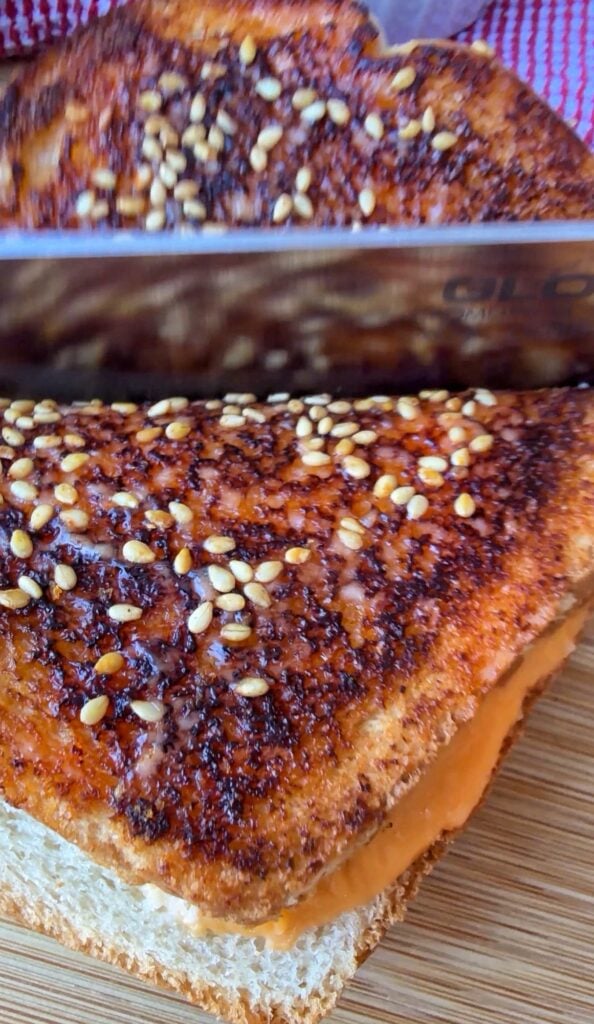 A close up of the finished sandwich being cut