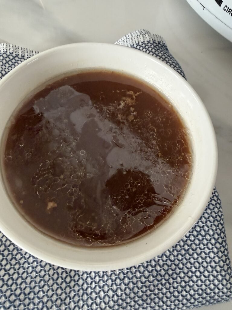 A bowl of ham drippings