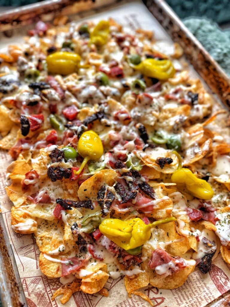 Charcuterie-Style Baked Nachos with Creamy Sun-Dried Tomato Cheese Sauce