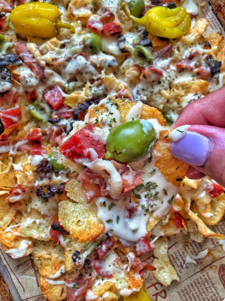 A close up of a finished nacho chip