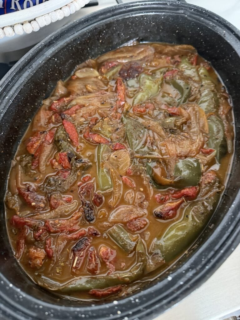 The finished au jus in the crock pot