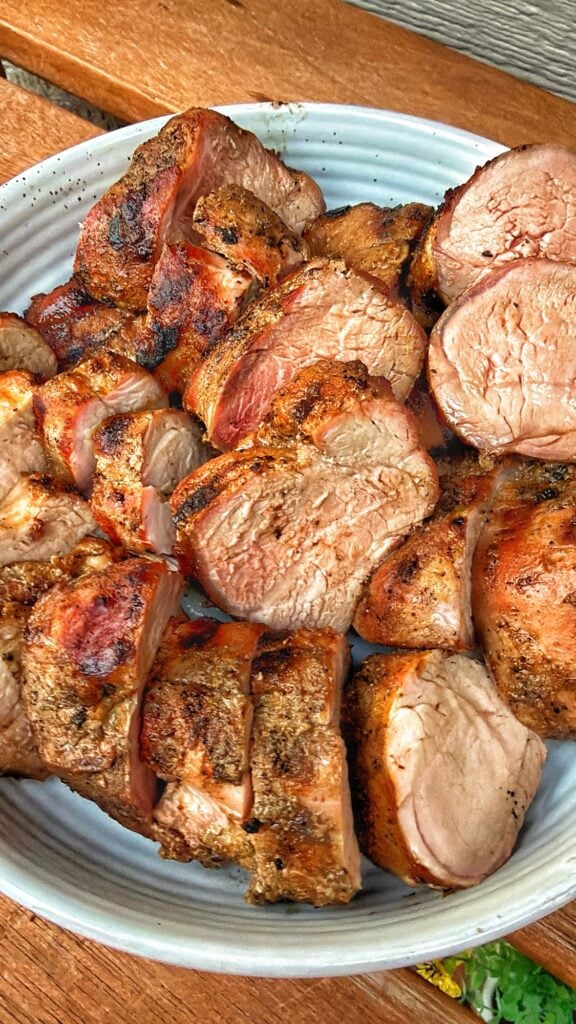 The finished pork, sliced up on a plate