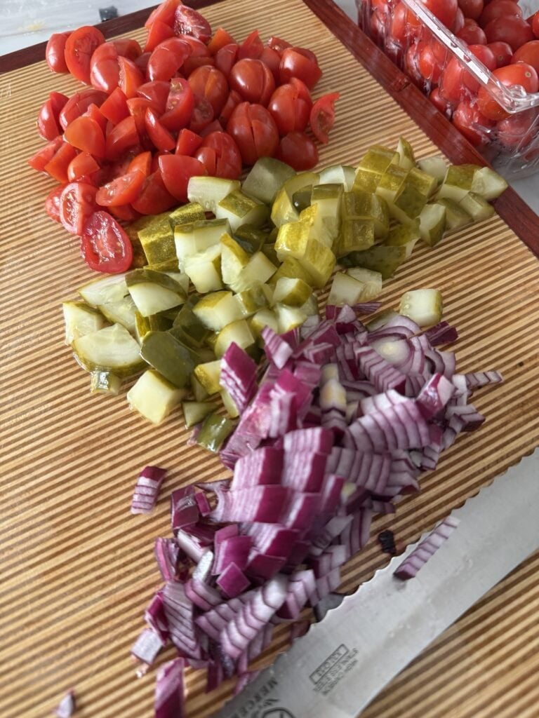 Chopped tomato, pickle, and red onion