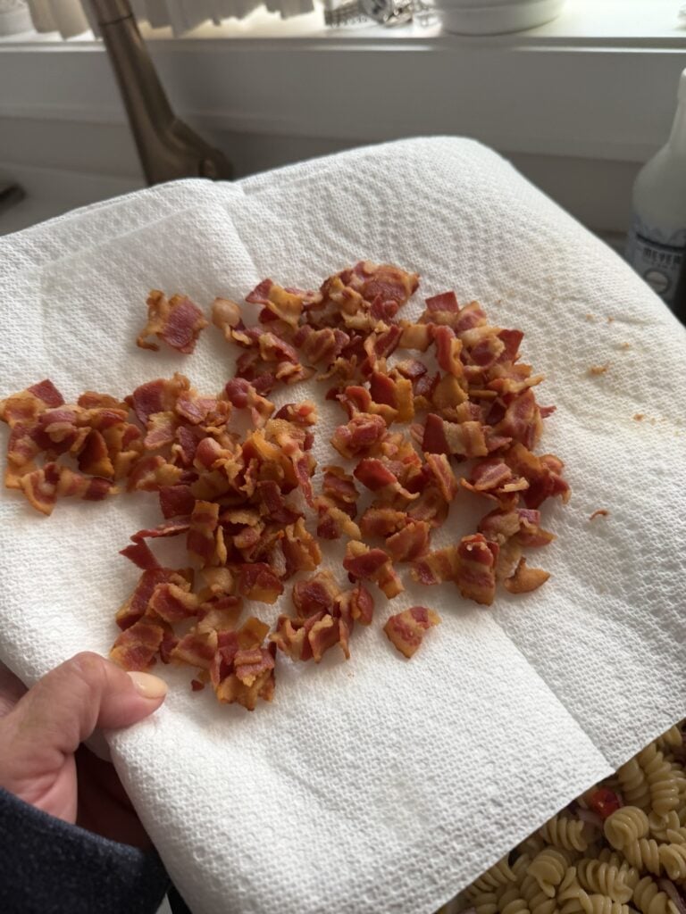 Chopped bacon on a paper towel