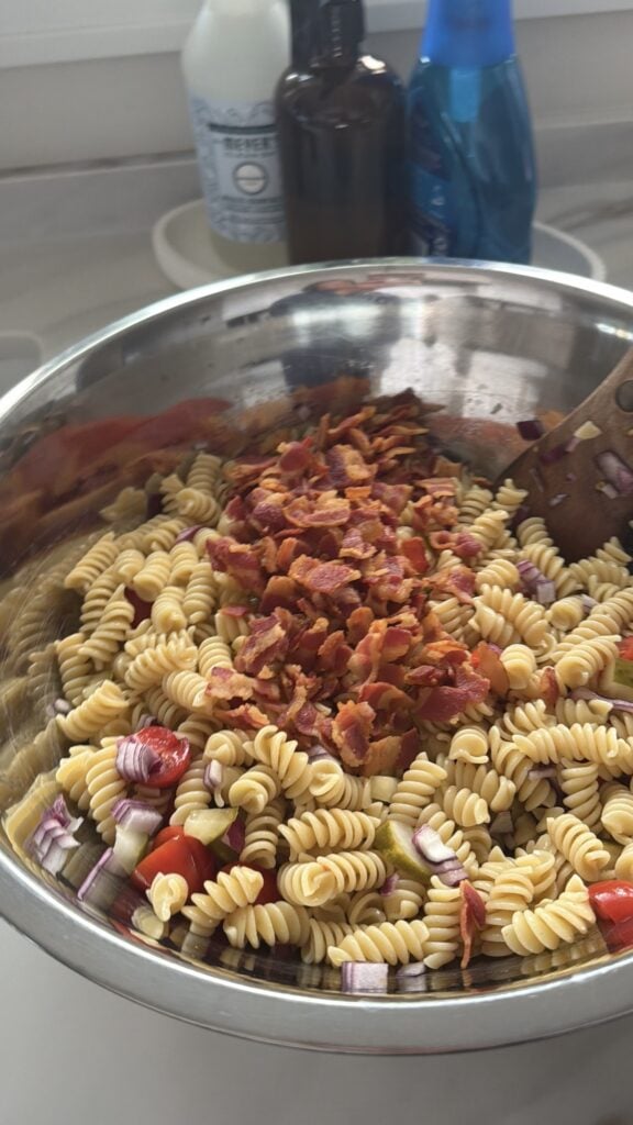 Chopped bacon over the salad