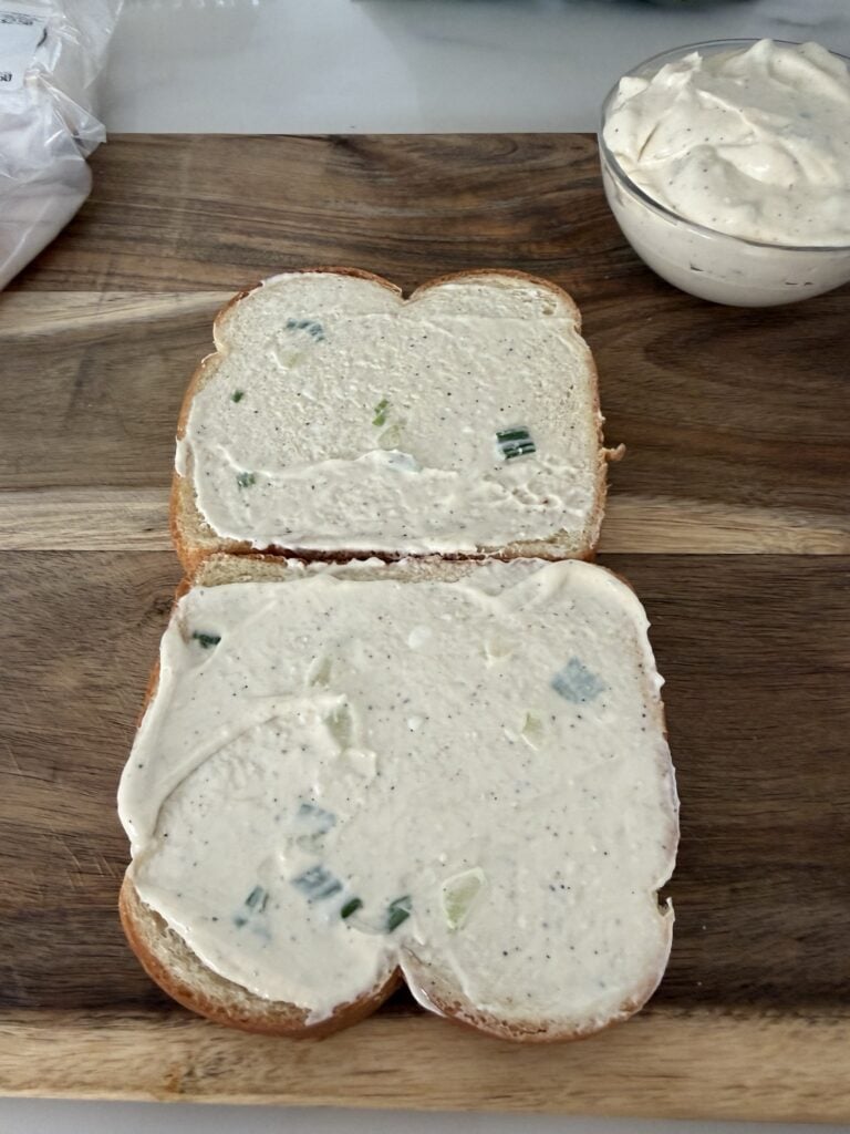 Two slices of bread with the celery salt spread