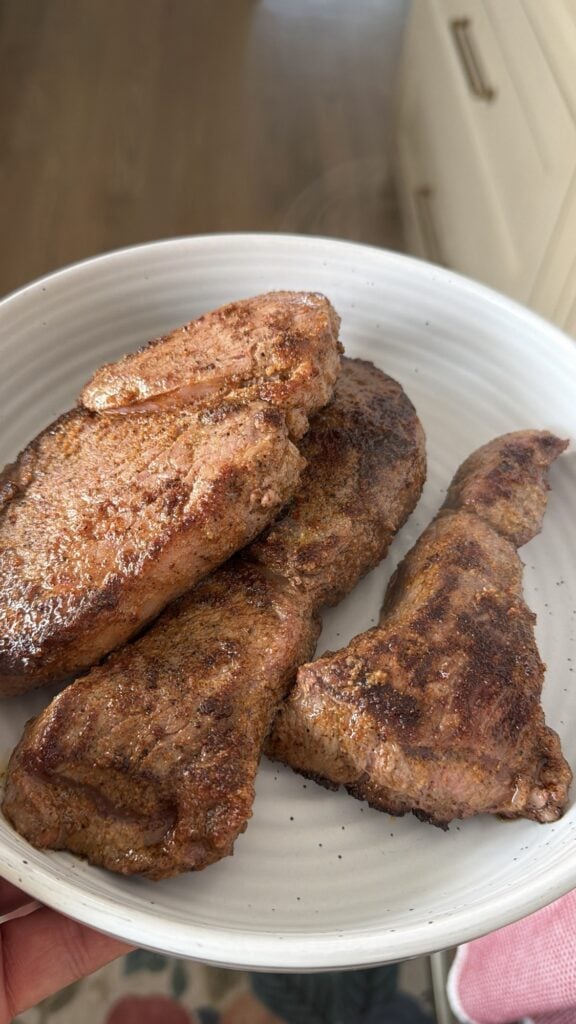 Cooked steaks on a plate