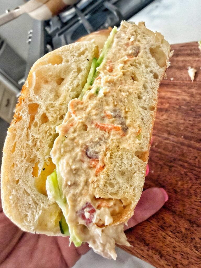 A close up of the chicken salad sandwich cross section