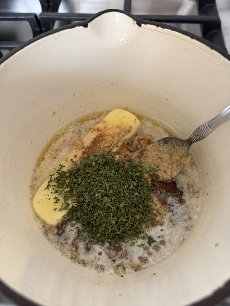 The ingredients for the Dijon butter in a pot
