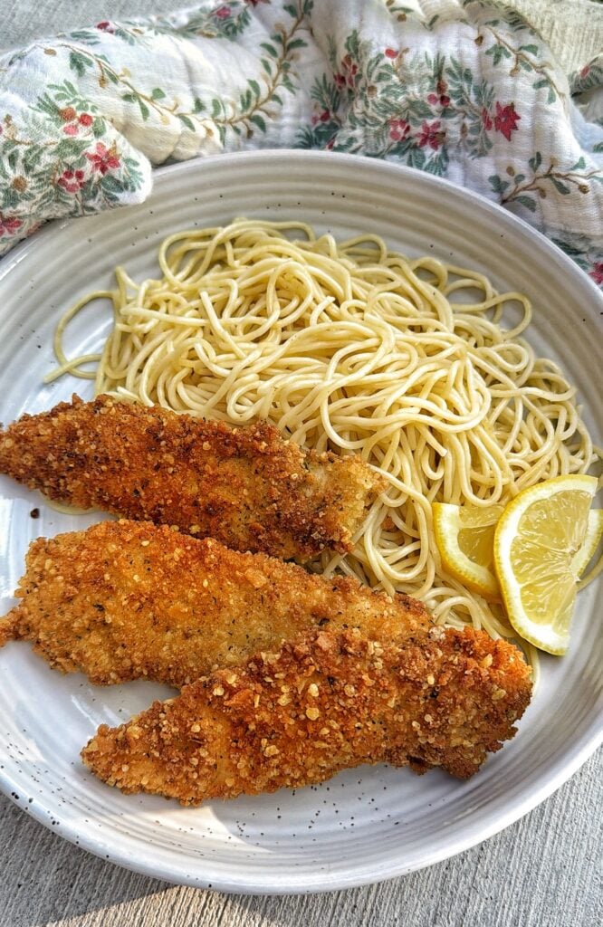 Crispy Costoletta Style Chicken Tenders with Butter Lemon Sauce and spaghetti