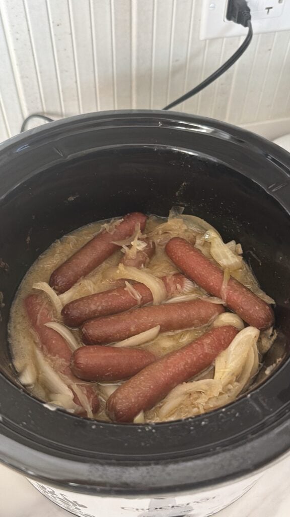 hot dogs with cooked onion in the crock pot