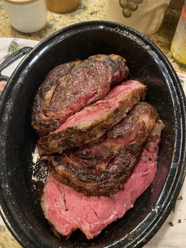 Leftover sliced rib roast ready to use for sandwiches, soup, or another meal.