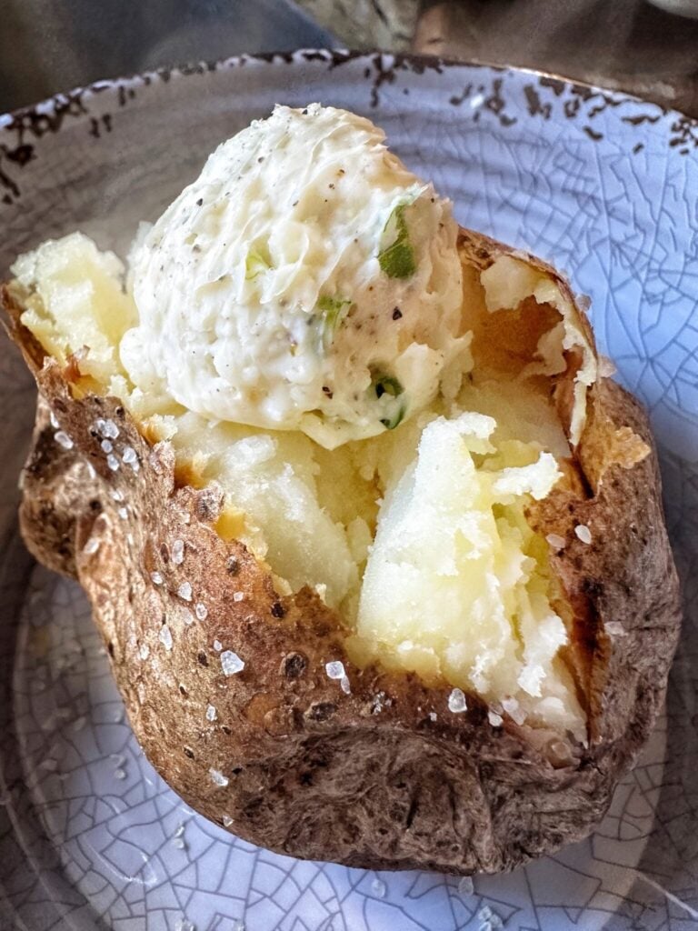Twice Baked Potato Butter Ball on a baked potato