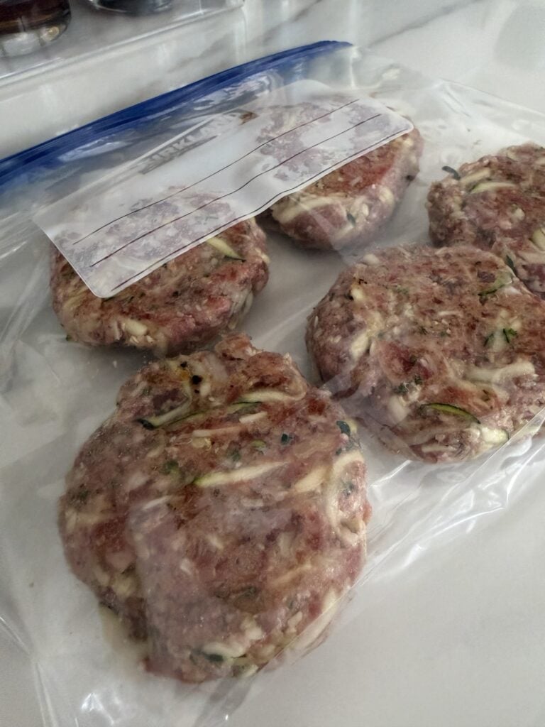 The formed but raw patties in a plastic ziptop bag