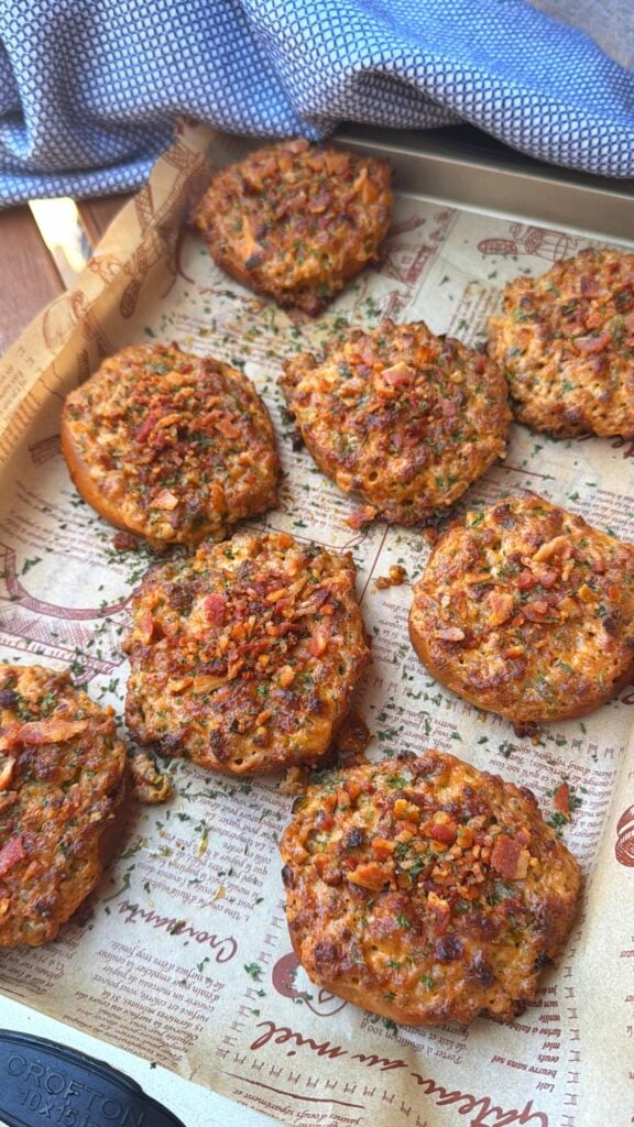 The finish baked breakfast muffins on a baking sheet