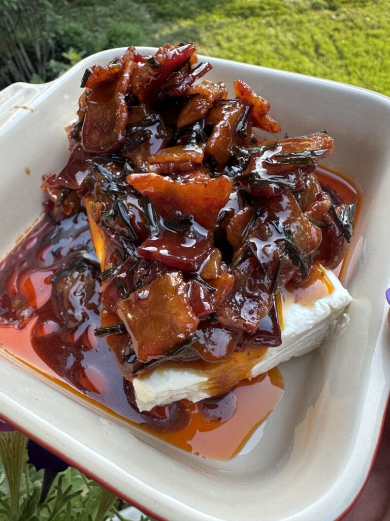 Maple soy glazed bacon over cream cheese