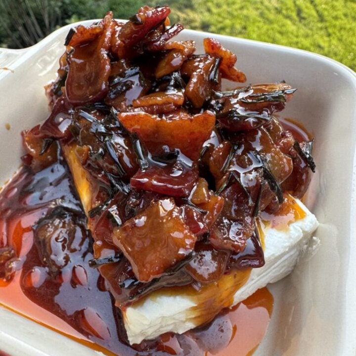 Chili Bacon Crunch Cream Cheese Spread topped with maple bacon and spicy chili onion crunch