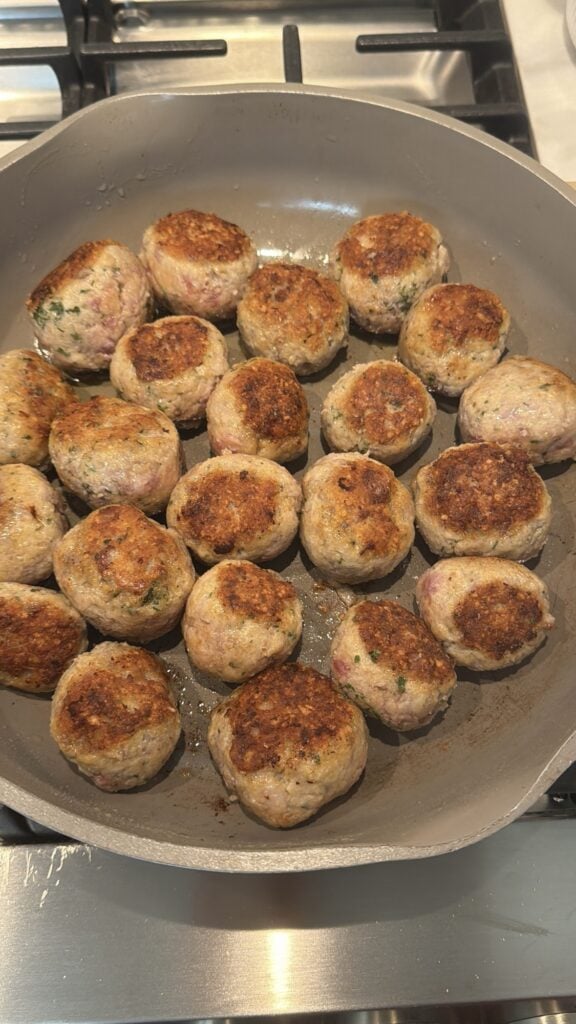 Meatballs cooking in the pan