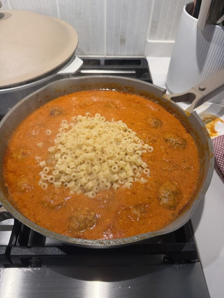 Ditalini pasta in the meatball mixture