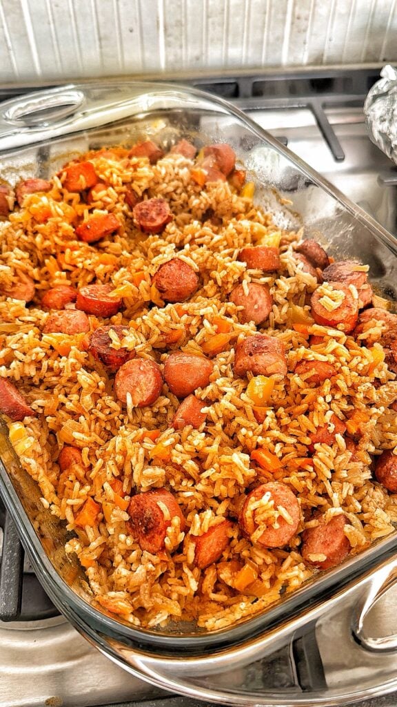 Cheddar Brat and Rice Bake in a glass baking dish