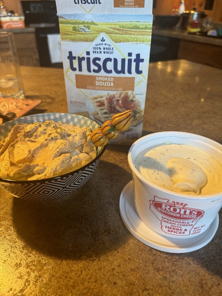 Wisconsin pâté spread next to a tub of Wisconsin spreadable cheese