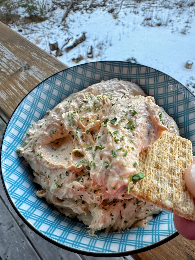 Triscuit cracker topped with creamy Wisconsin Pâté beef and cheese spread