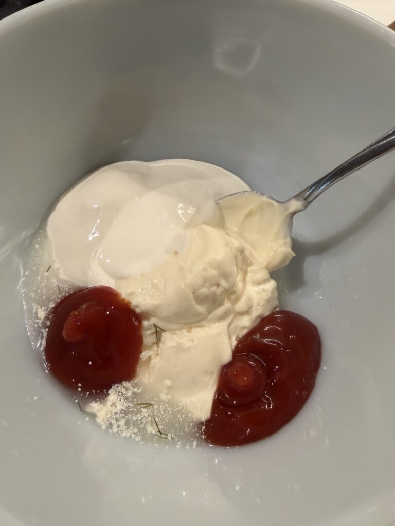 Ketchup, mayo, and pepperoncini juice about to be mixed