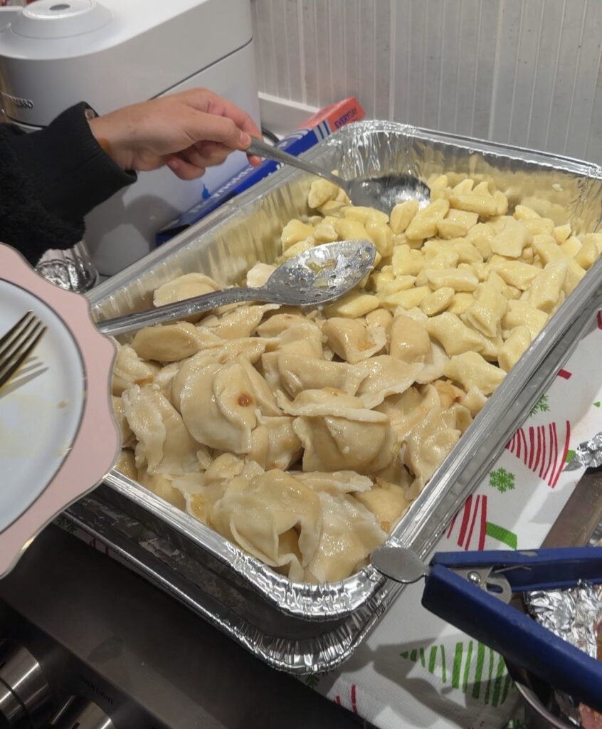 Pierogi and dumplings in a foil serving pan from Arcadia restaurant
