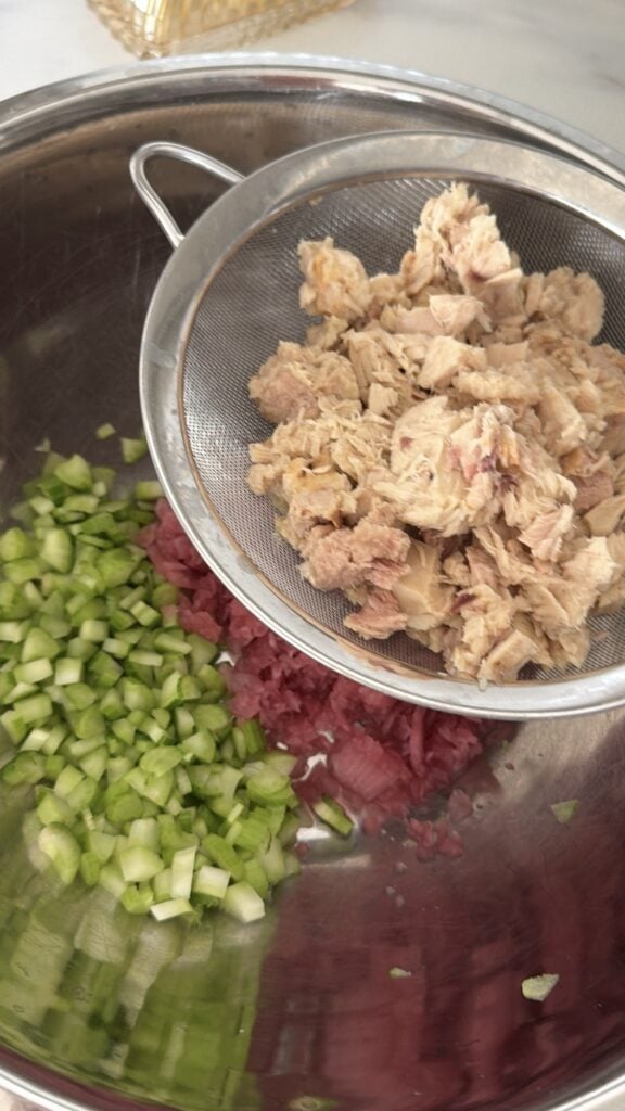 Well-drained canned tuna gently broken into chunks with a fork