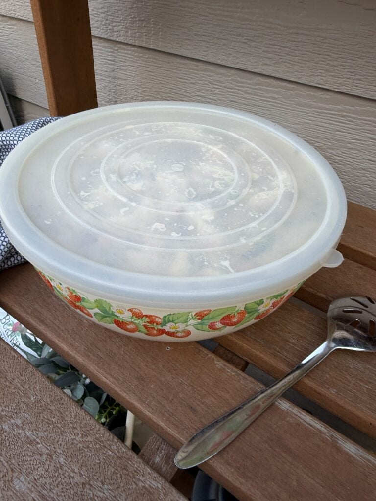 Pasta salad in a covered bowl to chill overnight