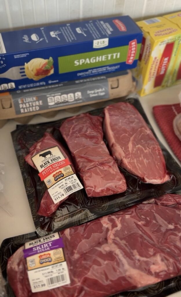 Three-pack of fresh sirloin steaks from Aldi used for an affordable steak dinner.